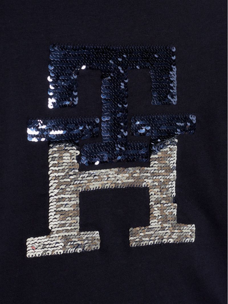 Remera-con-monograma-TH-de-lentejuelas