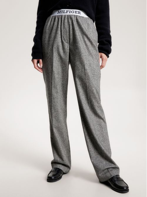 Pantalón holgado con logo en cintura
